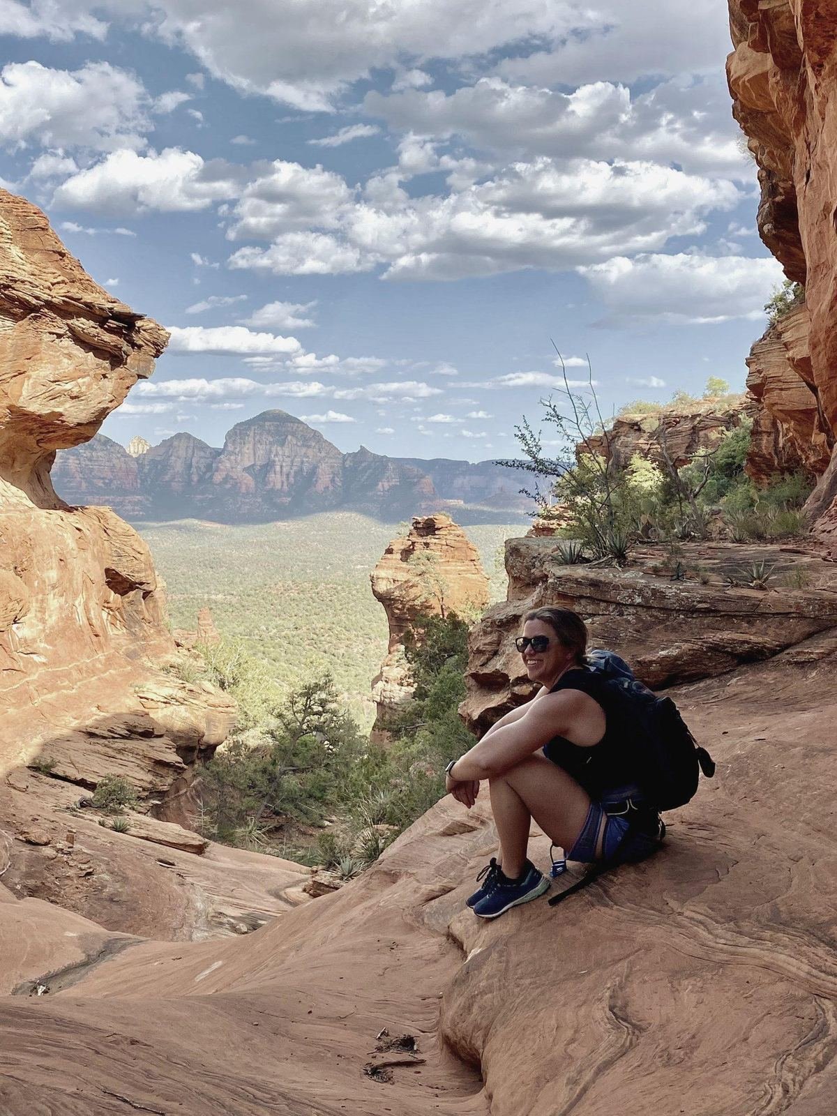 Tara Meier taking a break on the red rocks above Sedona, Arizona