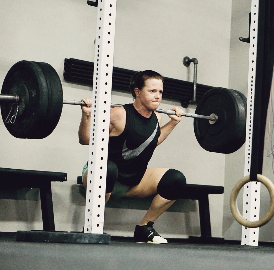 Tara Meier doing a barbell back squat